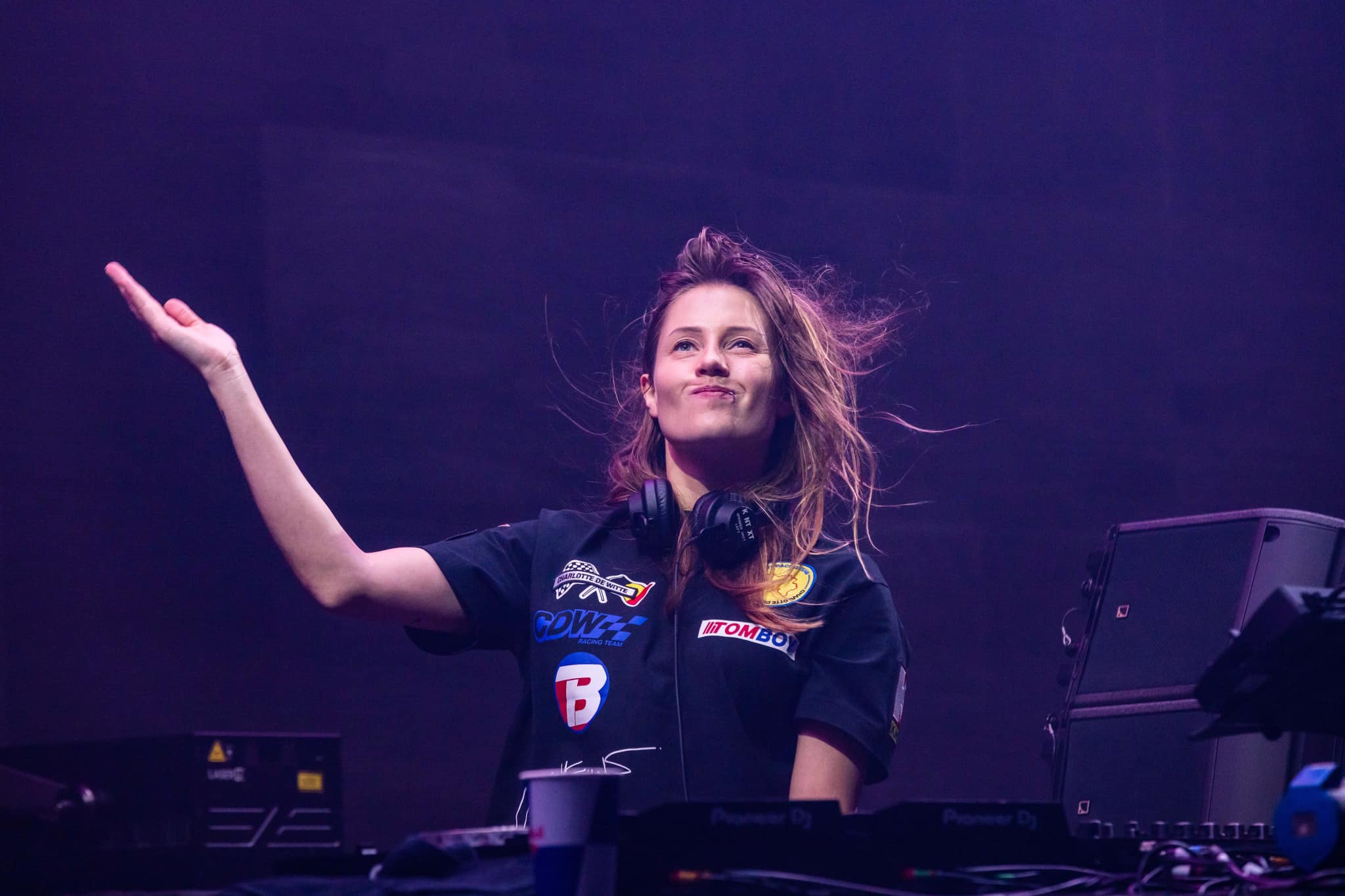 Female DJ performing on stage